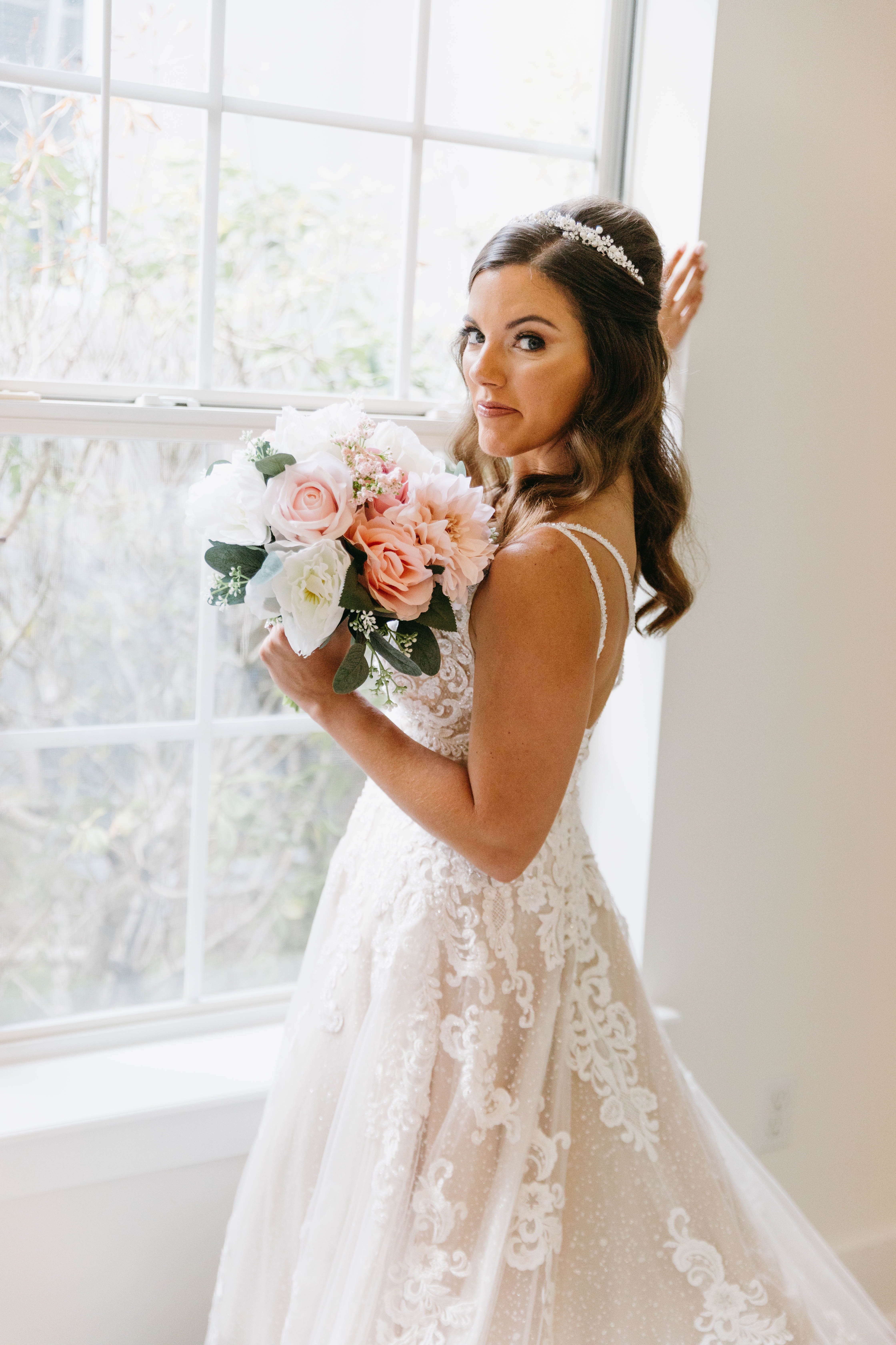 Happy newlyweds celebrating their beach wedding with joy and laughter
